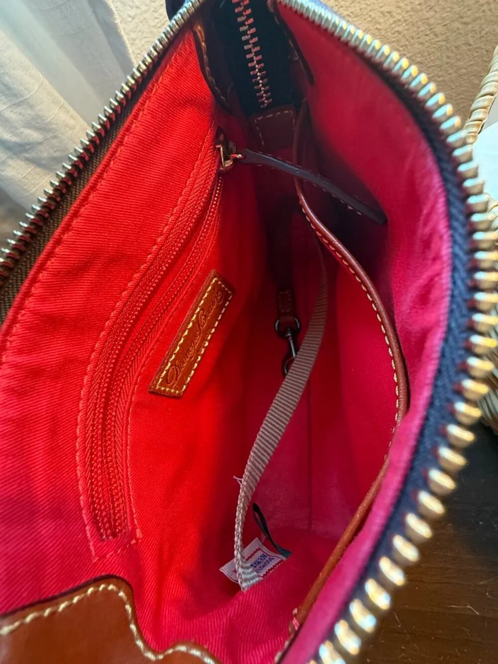 Dooney & Bourke Brown and Tan Logo Crossbody with Gold Plaque